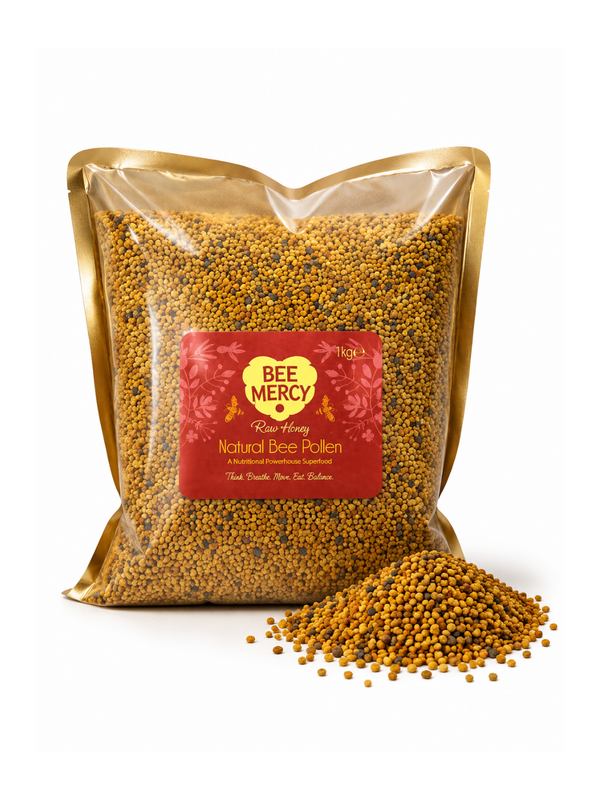 A clear stand-up pouch filled with golden yellow bee pollen granules, with a red and gold Bee Mercy label on the front. A small pile of the same pollen granules sits in front of the bag on a clean white background.